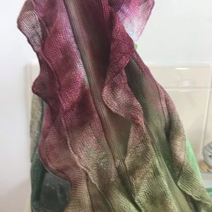 Ruffle shall poncho in a burgundi/vibrant green!